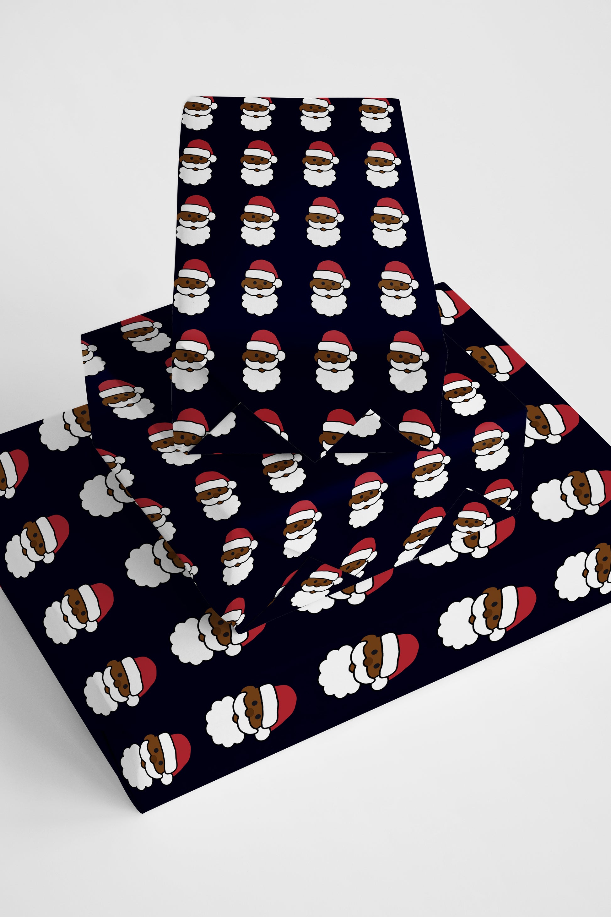 Modern and fun emoji Santa wrapping paper, perfect for adding a cheerful, lighthearted touch to holiday gifts.