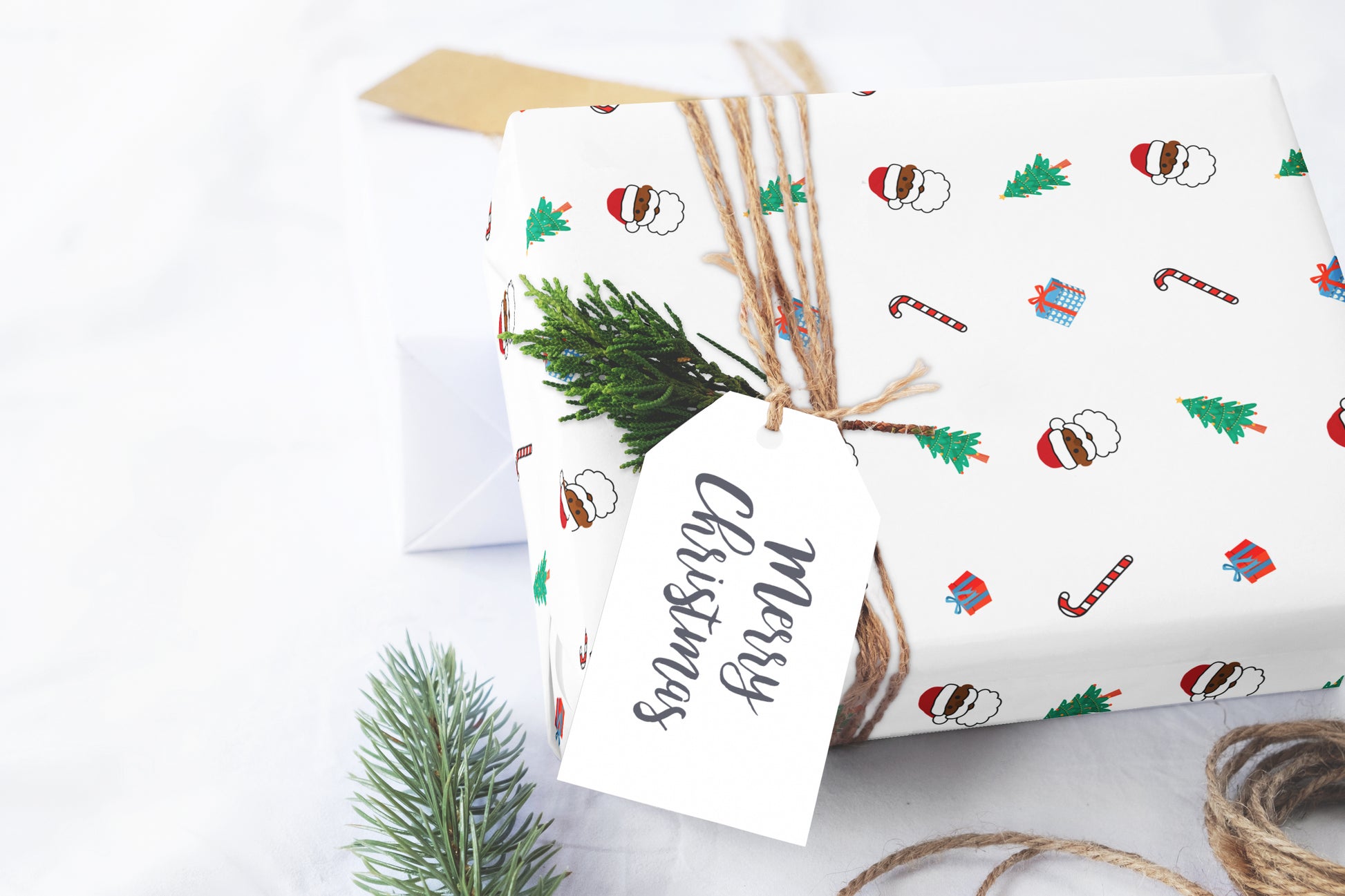 A roll of cute Black Santa gift wrap with a playful design, perfect for holiday presents.