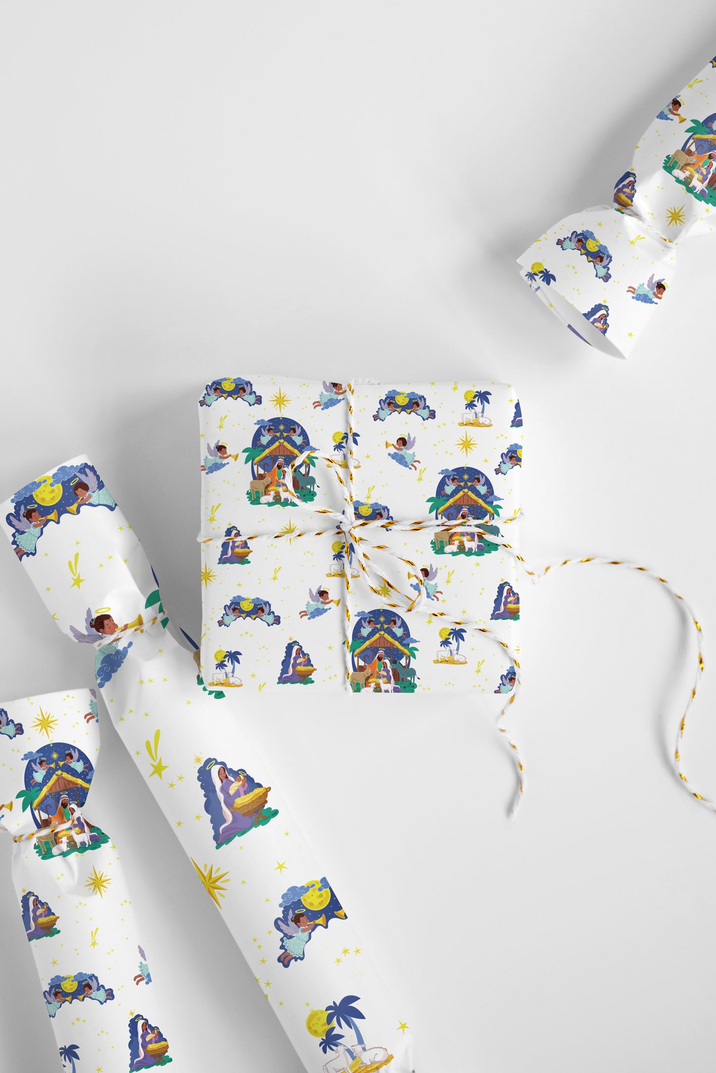 Roll of Winter Village Scene gift wrap paper with a snowy design for holiday and celebration gifts.