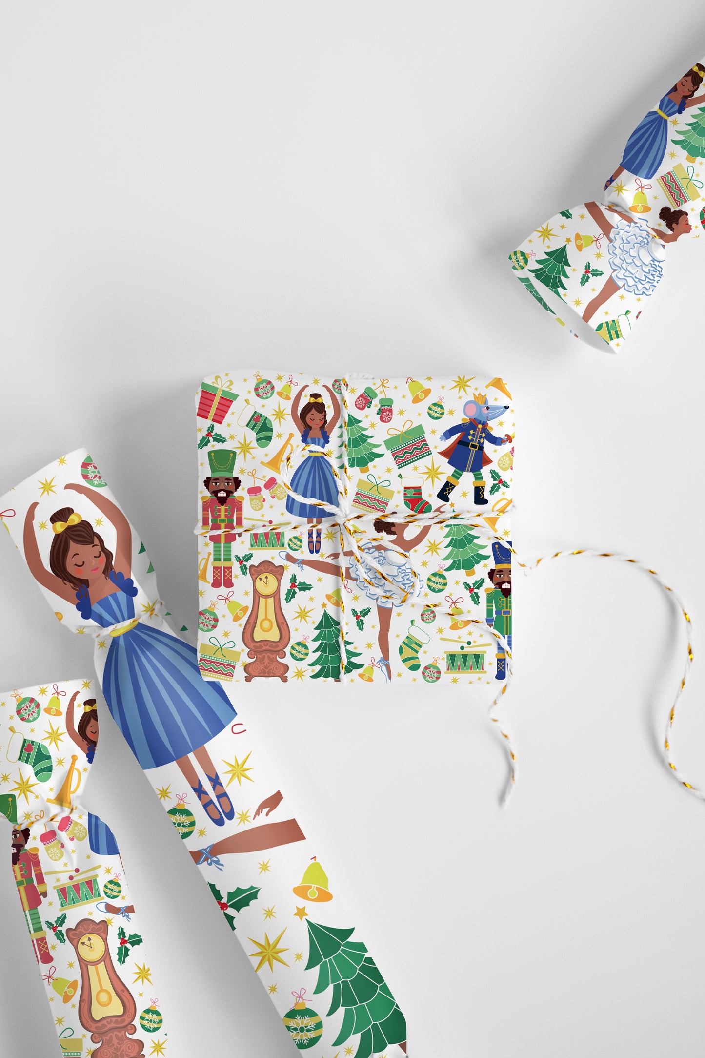 Elegant nutcracker and ballerina wrapping paper in a chocolate brown and gold palette for winter holiday presents.